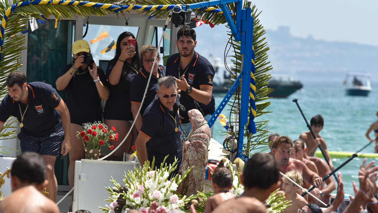 La romería marítima de la Virgen de la Palma en El Rinconcillo, en imágenes