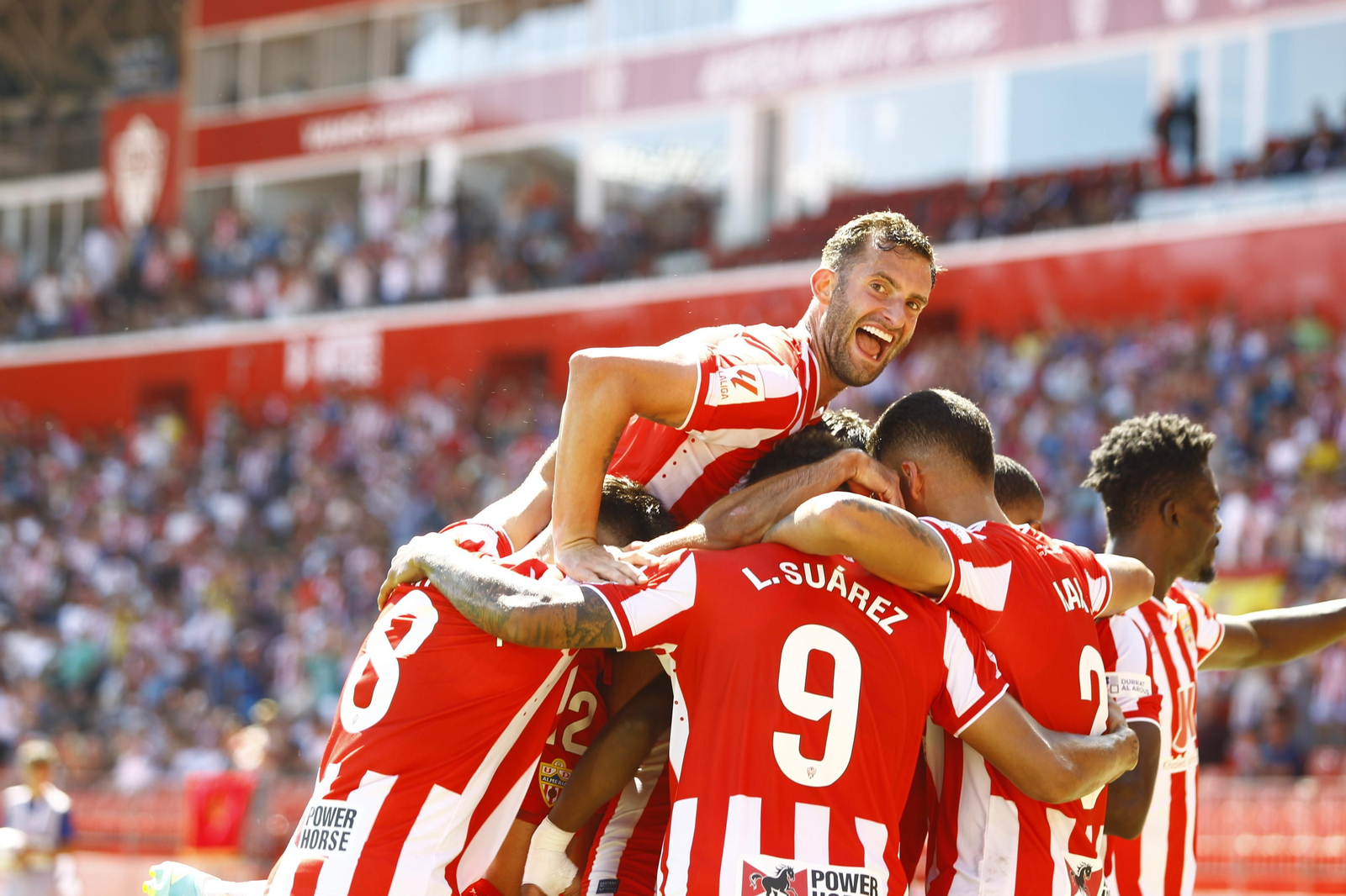 Imágenes del empate a 3 de la U.D. Almería y el Granada C.F.