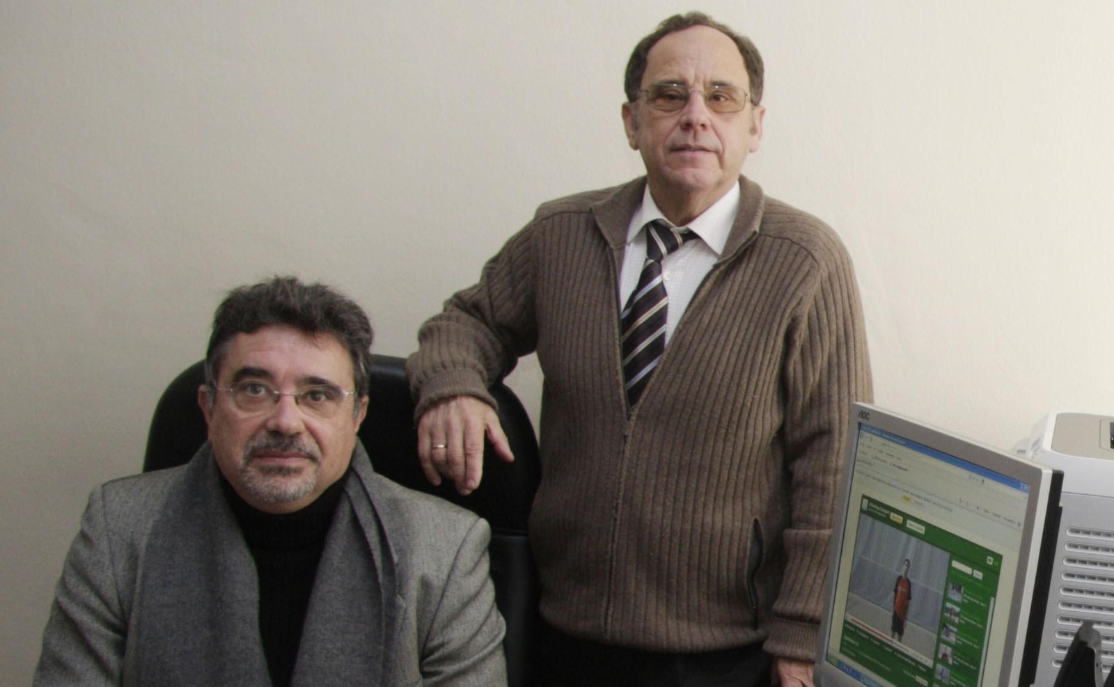 Juan de Pablos (i), con el catedrático condenado por abusos, Santiago Romero Granados (d).