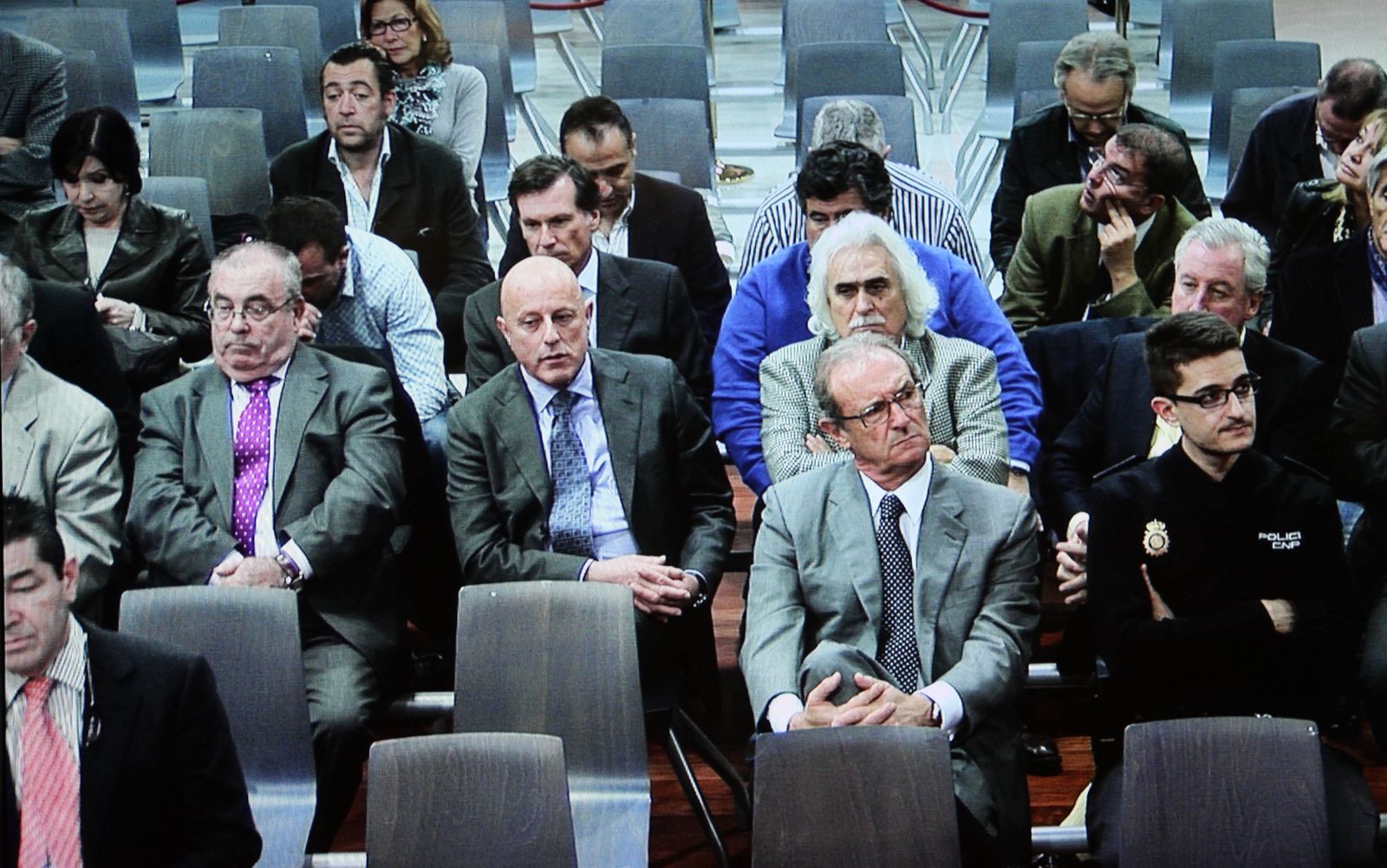 Tomás Olivo, en el centro, en el juicio por el caso Malaya, donde fue absuelto.