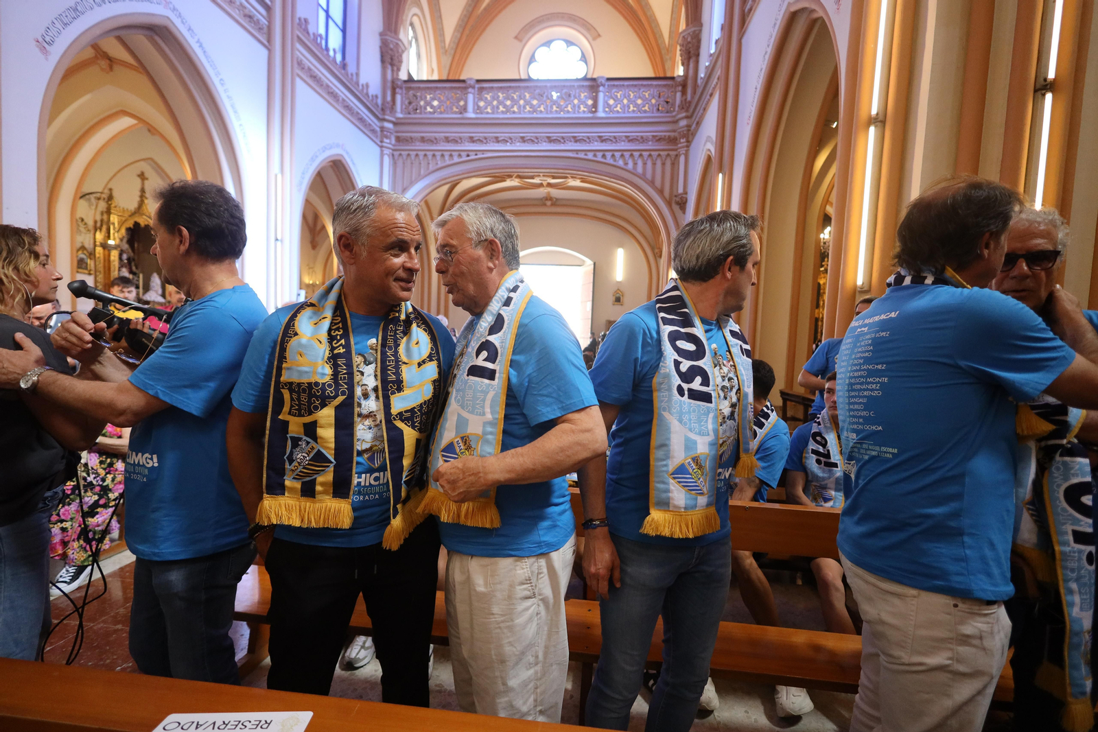 El malaguismo sale a la calle en avalancha: Las fotos de la celebración del ascenso