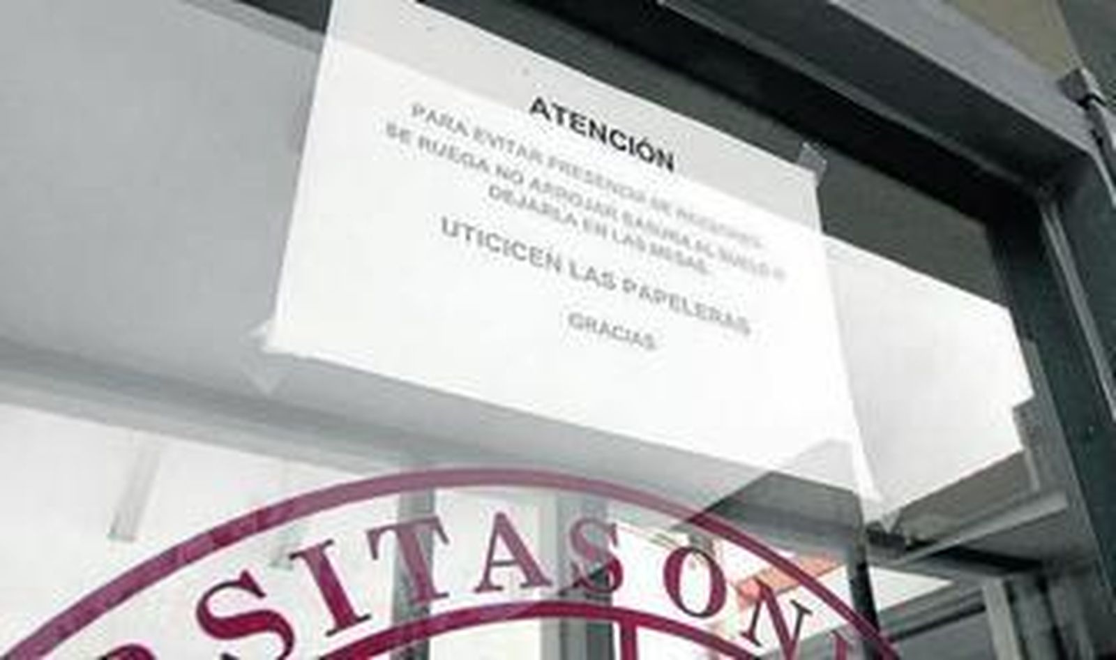 Cartel en el que se advierte de la presencia de roedores.