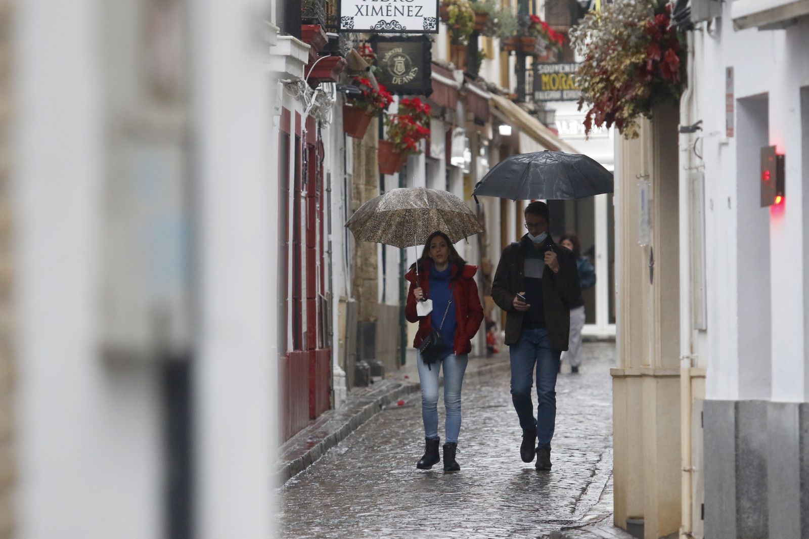 Un día de Navidad en Córdoba pasado por agua, en fotografías