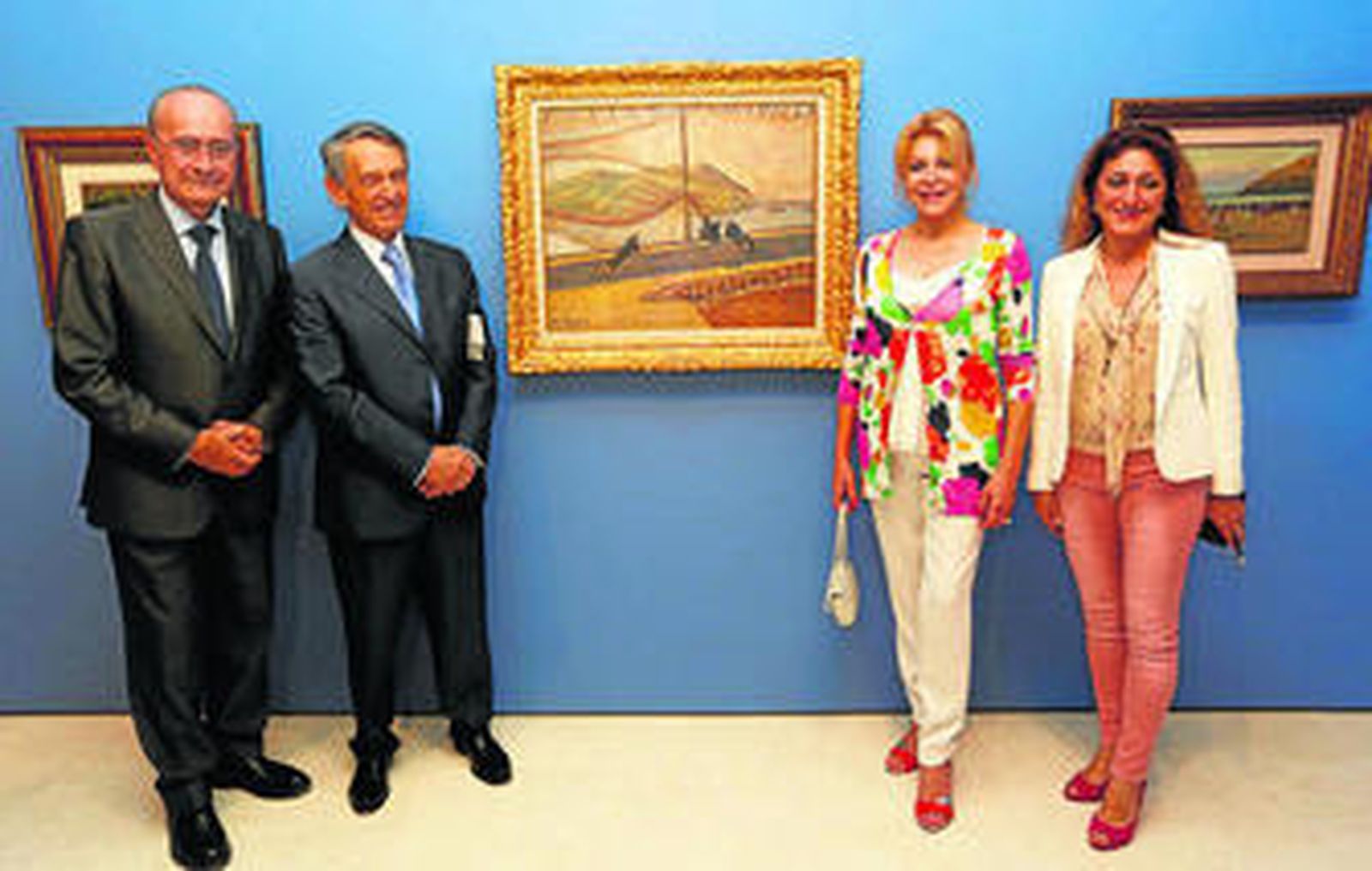 Francisco de la Torre, Juan San Nicolás, Carmen Thyssen y Lourdes Moreno, ante 'Las redes' (1893) de Regoyos.