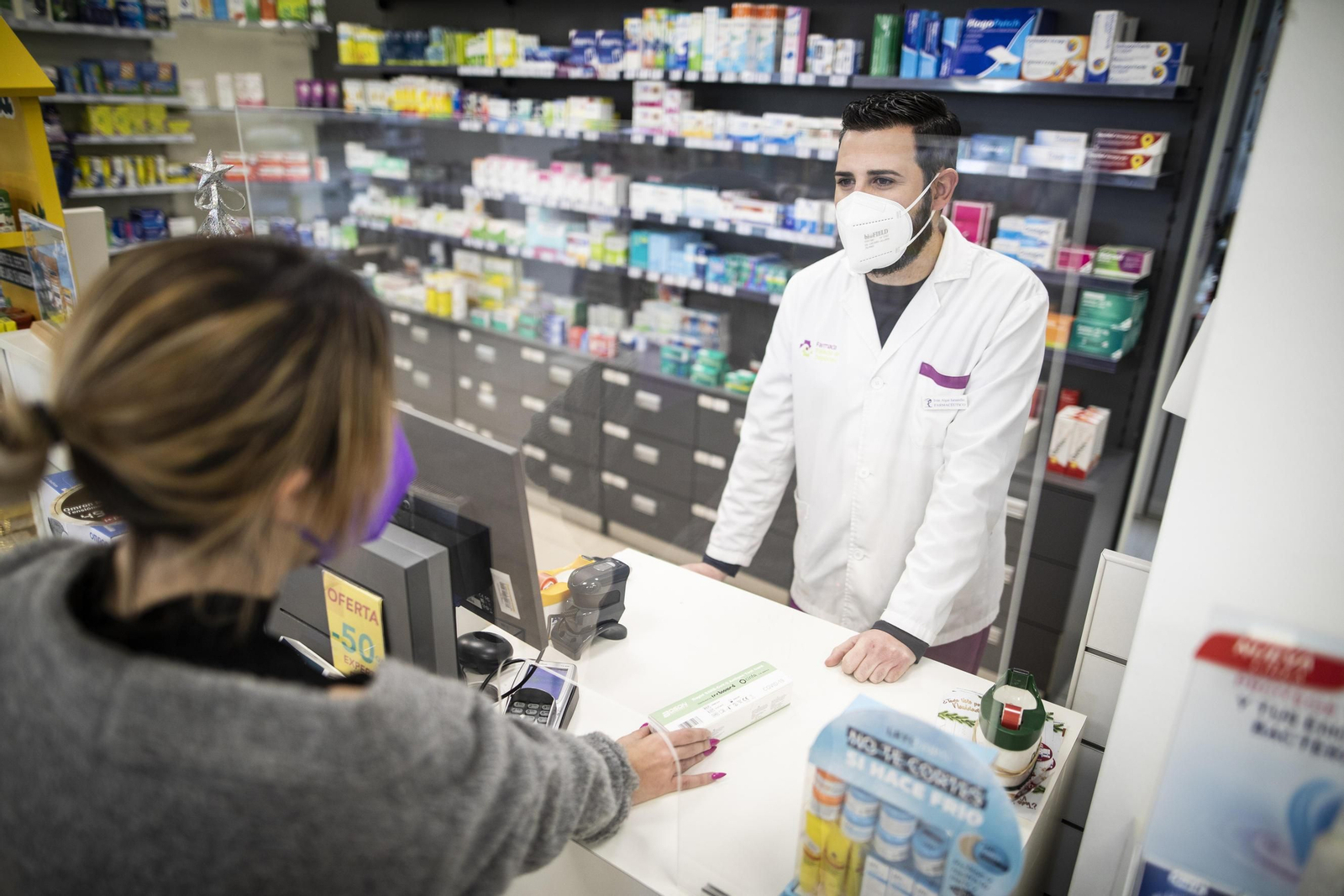Compra de un test en una farmacia.