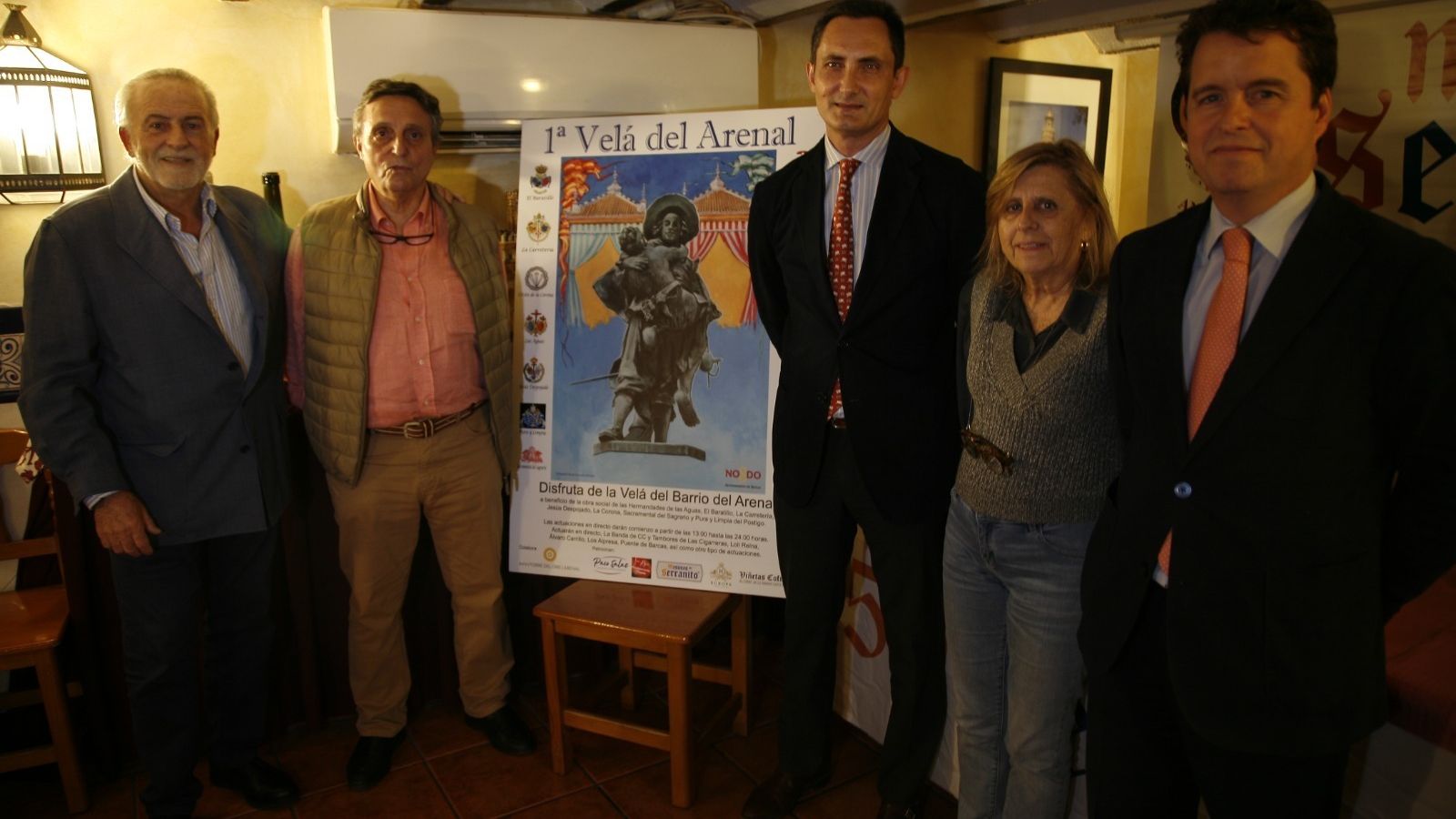 Entrega de la recaudación de la barra solidaria en el I Velá del Arenal