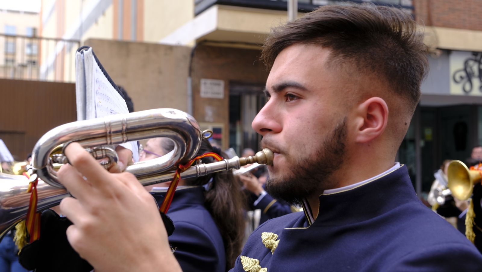 La Borriquita procesiona por las calles de Almería, en imágenes