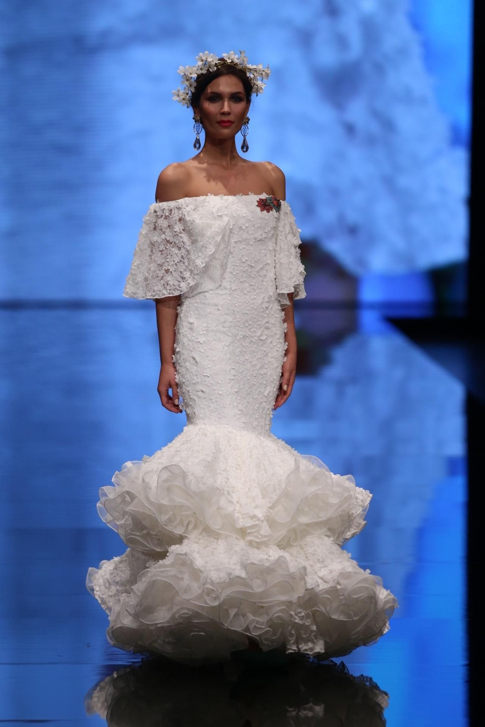 El traje de flamenca blanco y sus versiones más bonitas de esta temporada