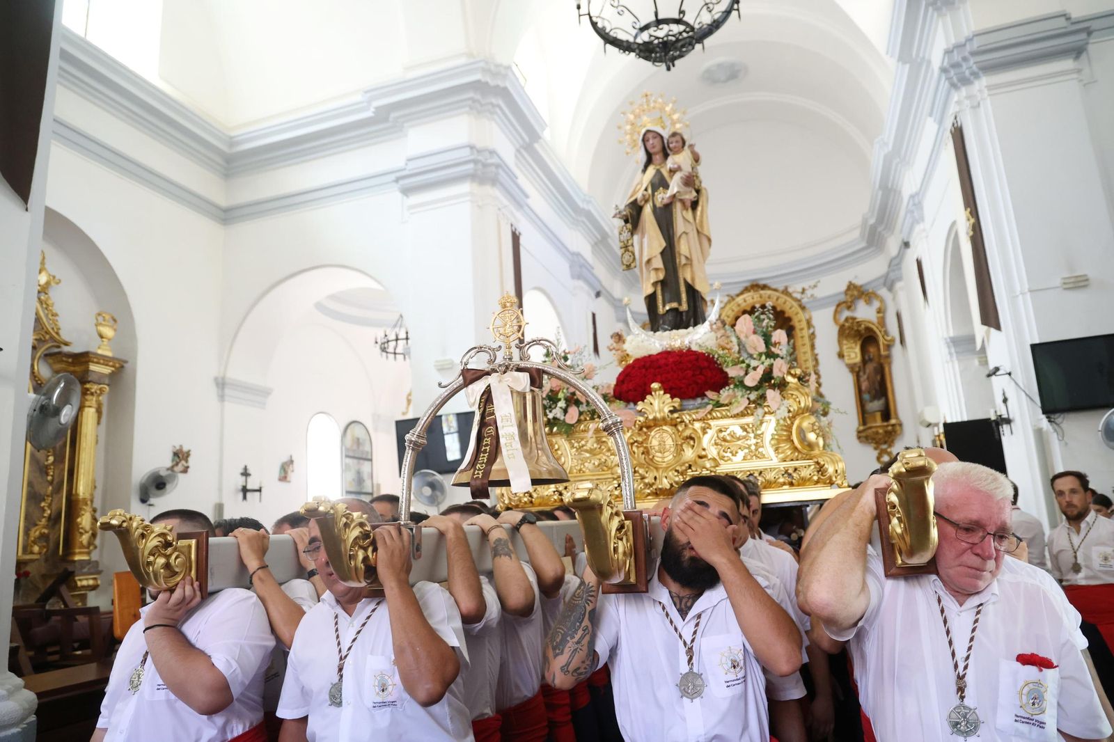 La procesión de la Virgen del Carmen en El Palo, en Málaga, en imágenes