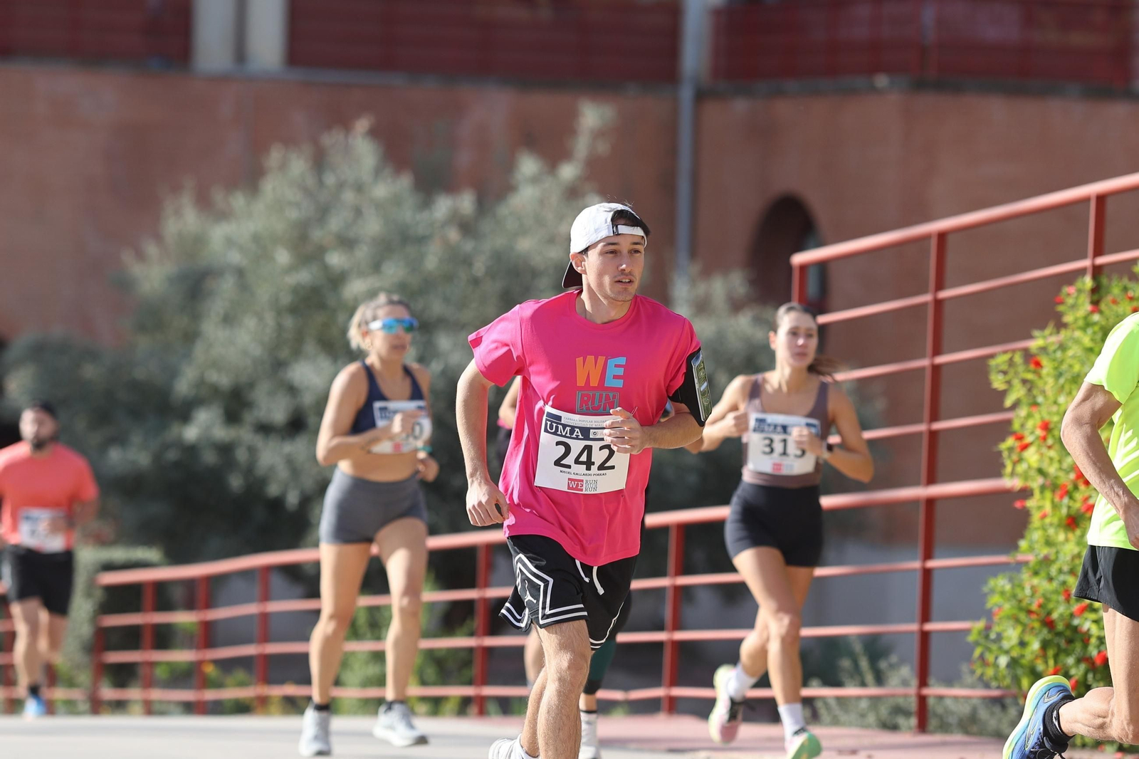 La carrera solidaria We Run de la UMA, en fotos