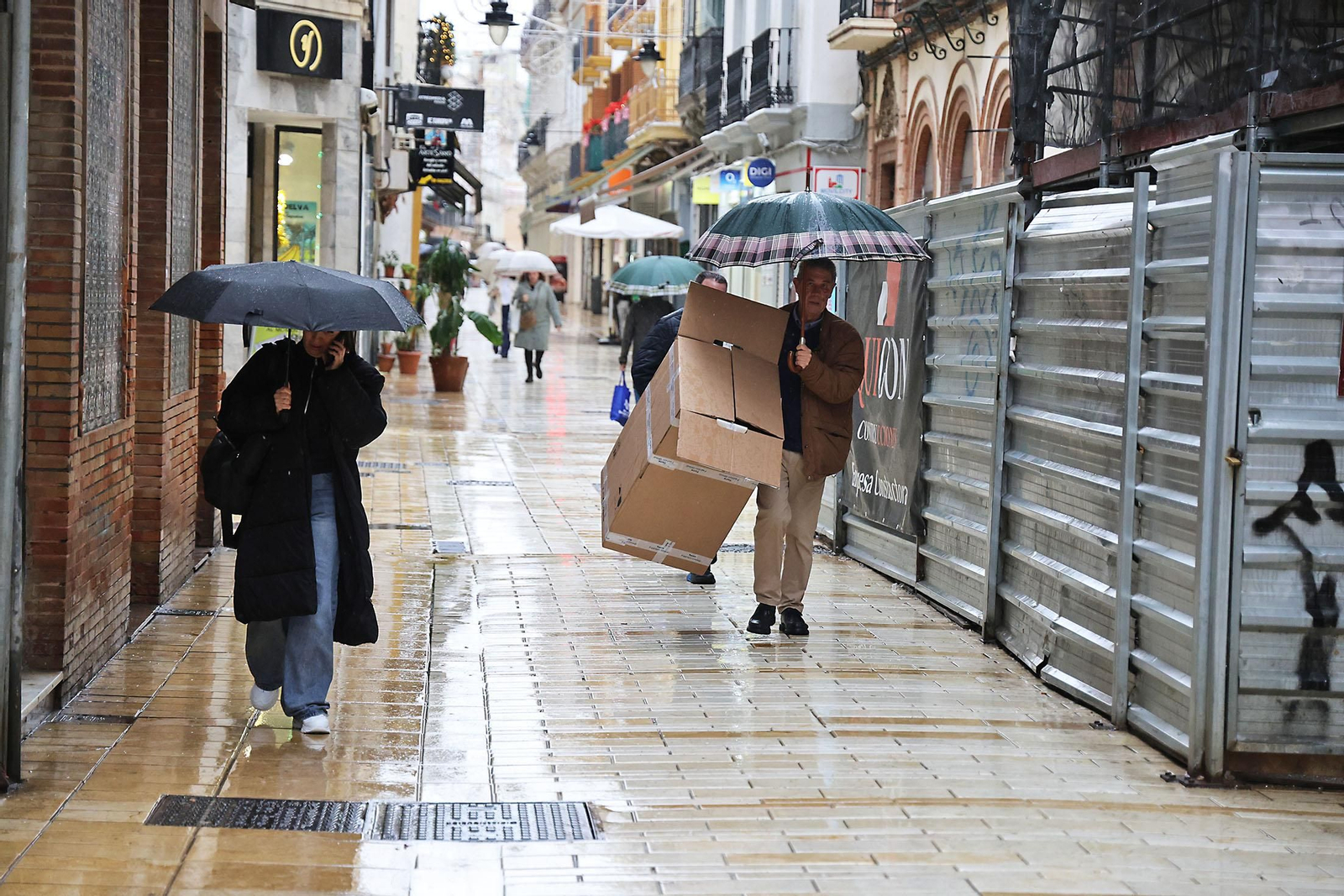 Las imágenes de la mañana de lluvia en Huelva