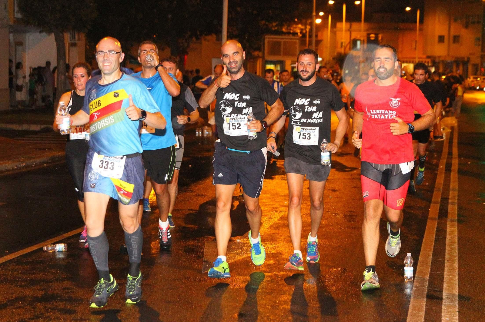 La VII Carrera Nocturna de Huelva en imágenes