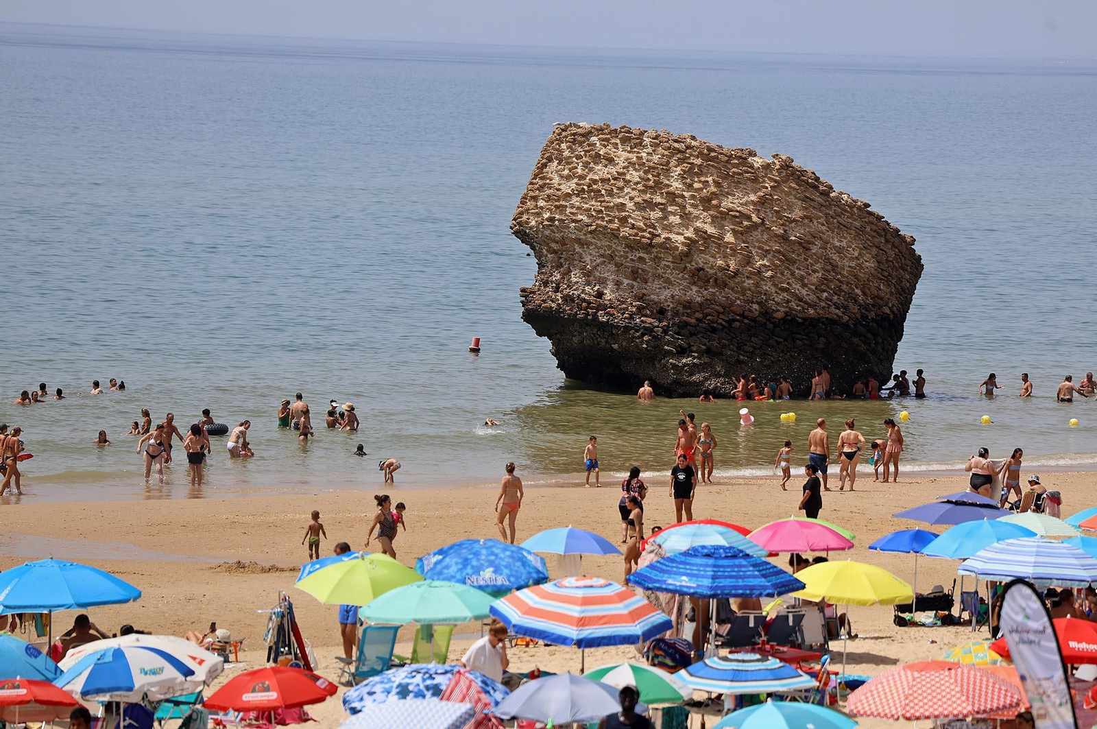 Imágenes del caluroso día en la playa de Matalascañas