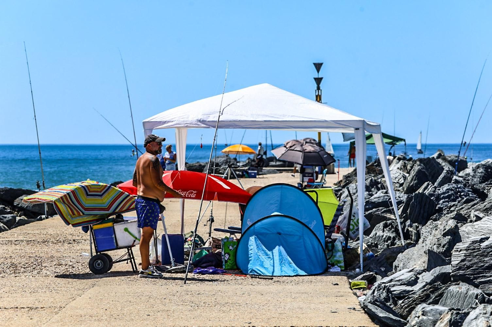 Imágenes de la soleada mañana de playa en Punta Umbría