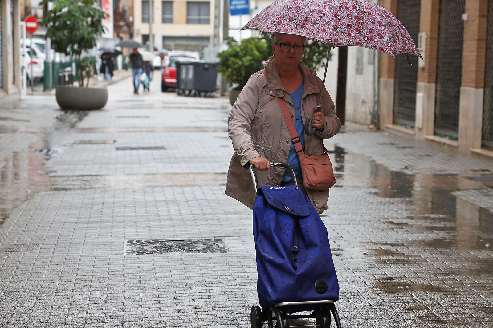 Imágenes de la lluviosa mañana de sábado en Huelva