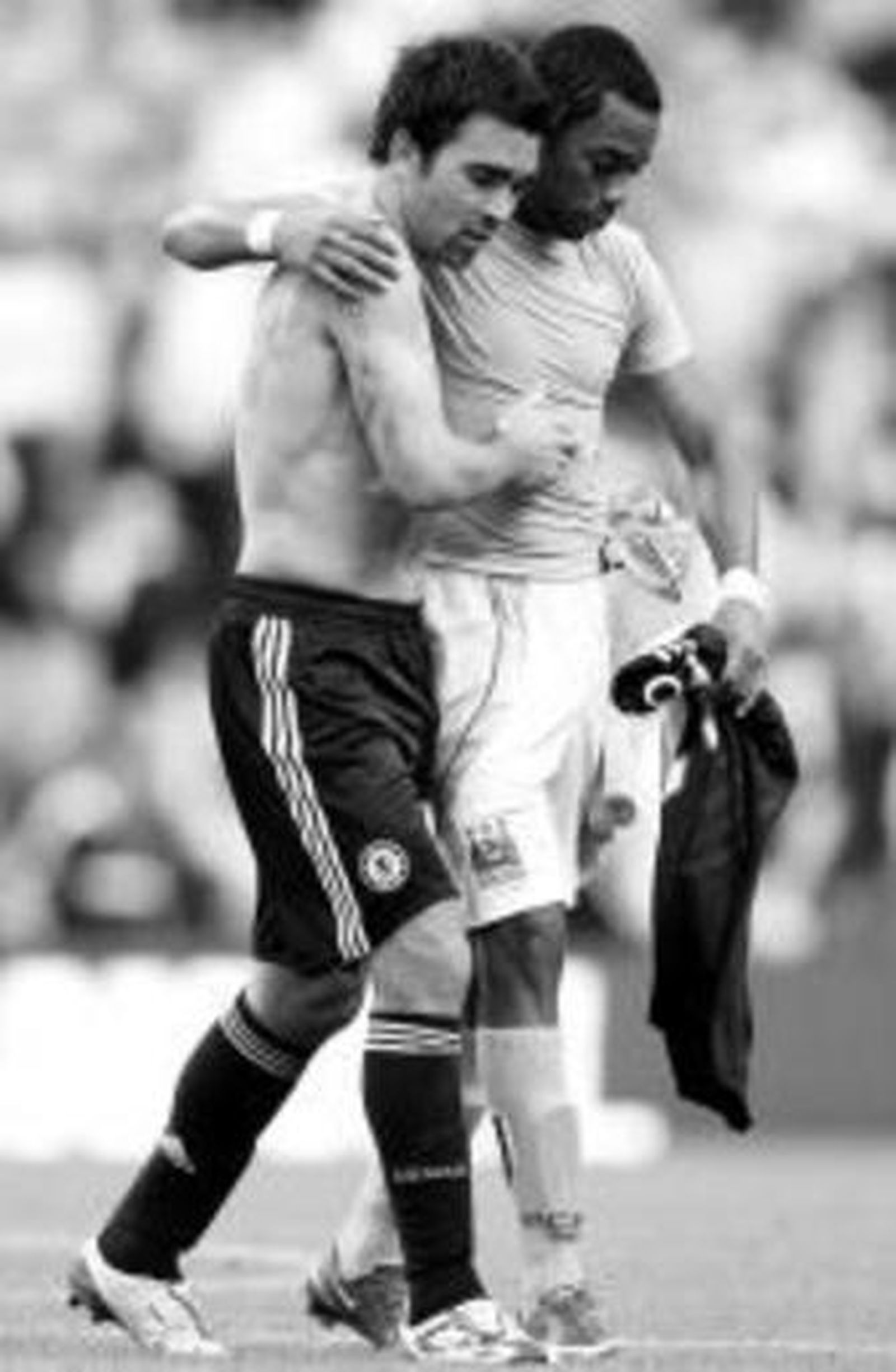 Robinho junto a Deco.