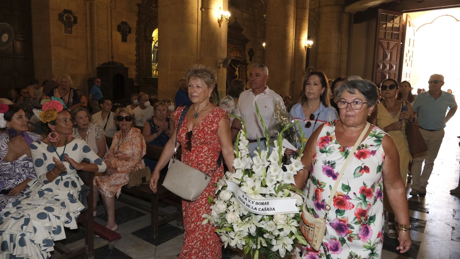 Imágenes de la ofrenda floral a la Virgen del Mar. Feria de Almería 2022