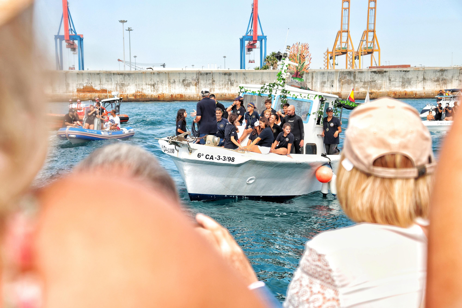 Embarque y procesión de la Virgen del Carmen del Perchel, en fotos