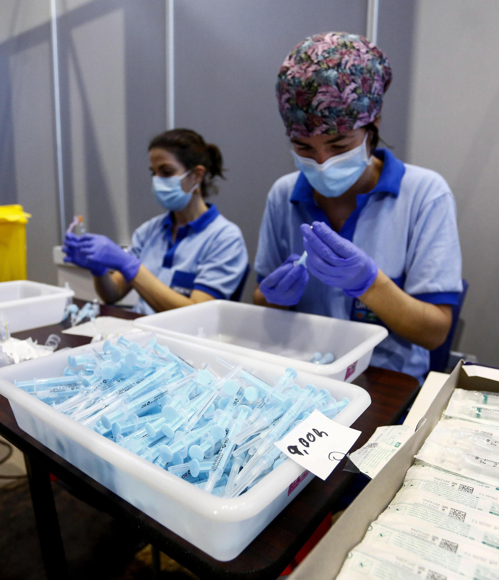 La vacunación del Palacio de Ferias de Málaga, en fotos