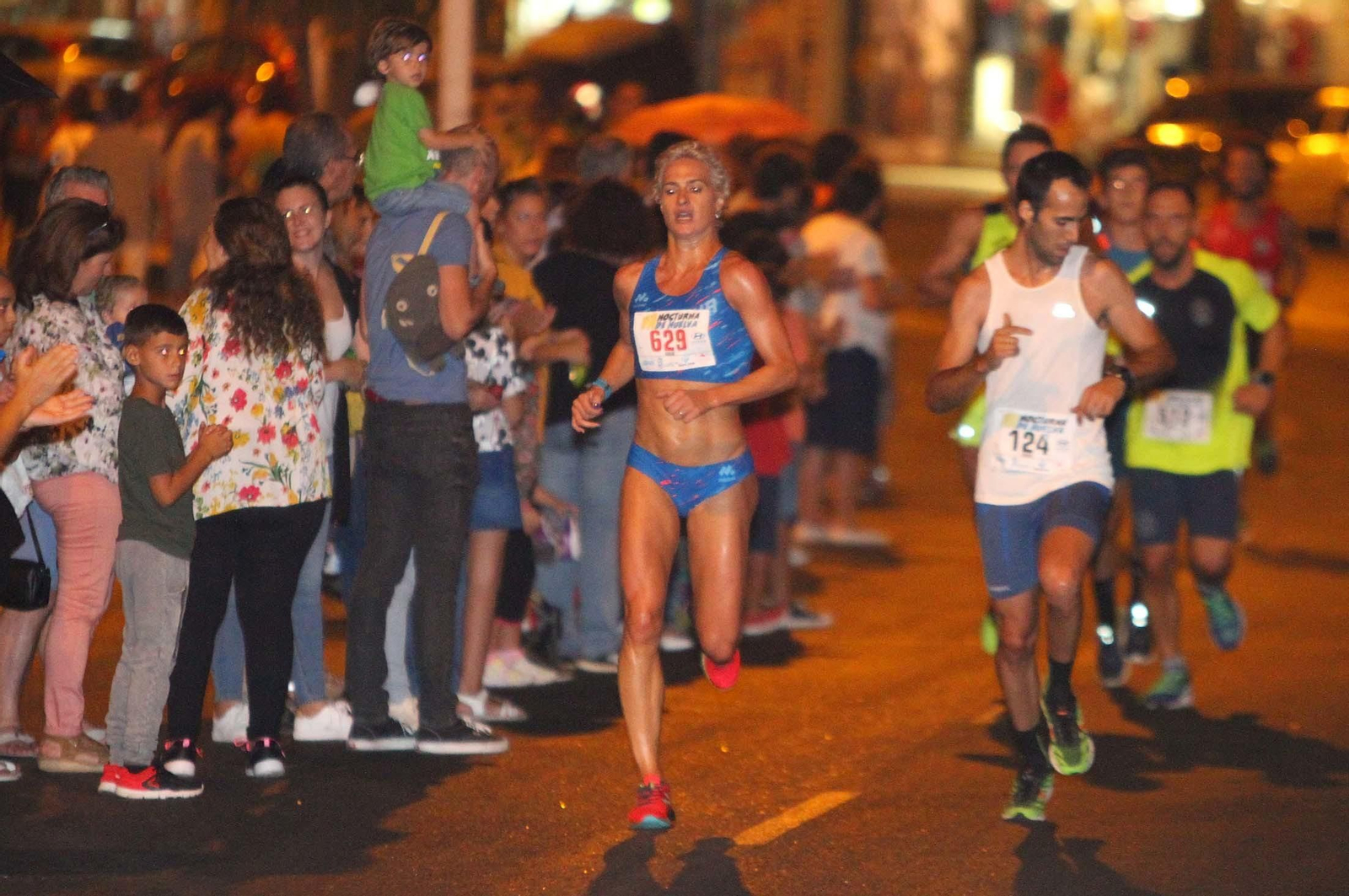 La VII Carrera Nocturna de Huelva en imágenes