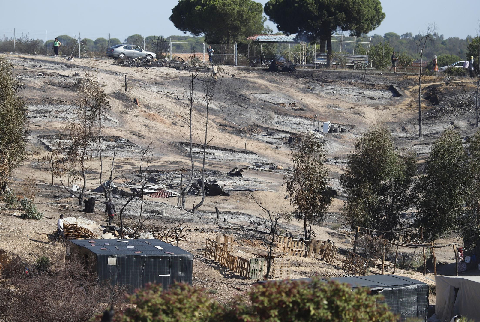Imágenes del incendio del asentamiento de chabolas de Palos de la Frontera