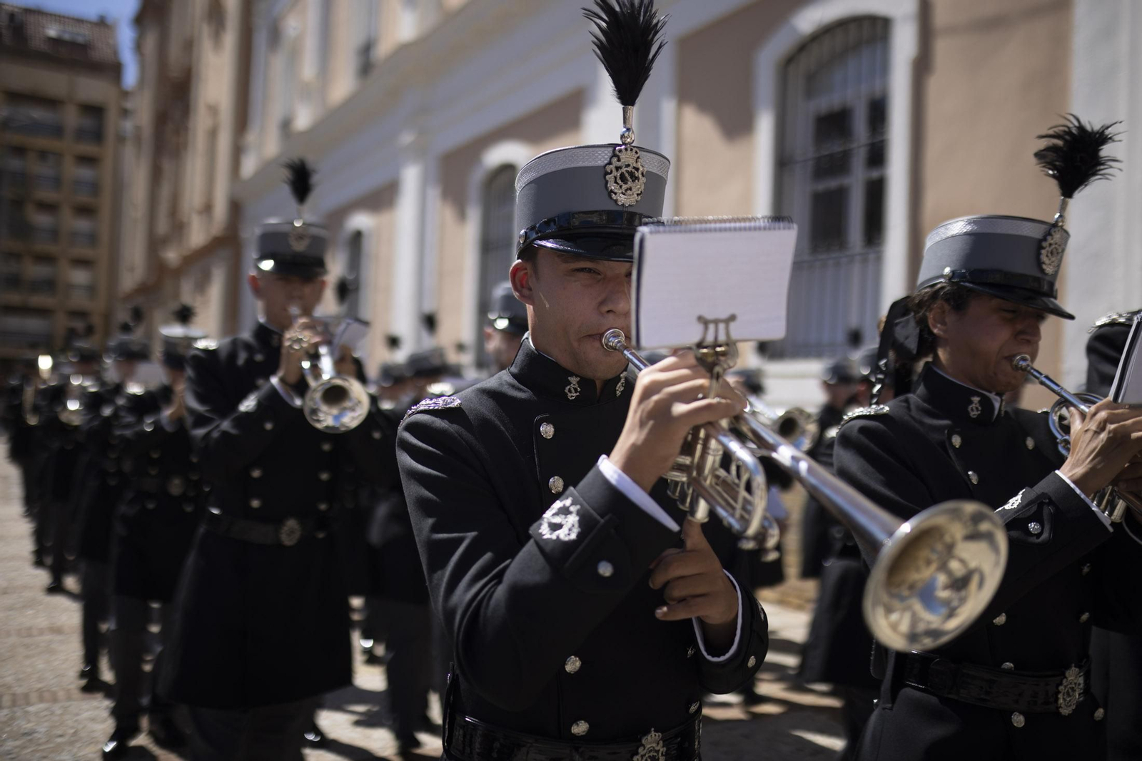 Imágenes de la salida extraordinaria de La Borriquita por las calles de Huelva