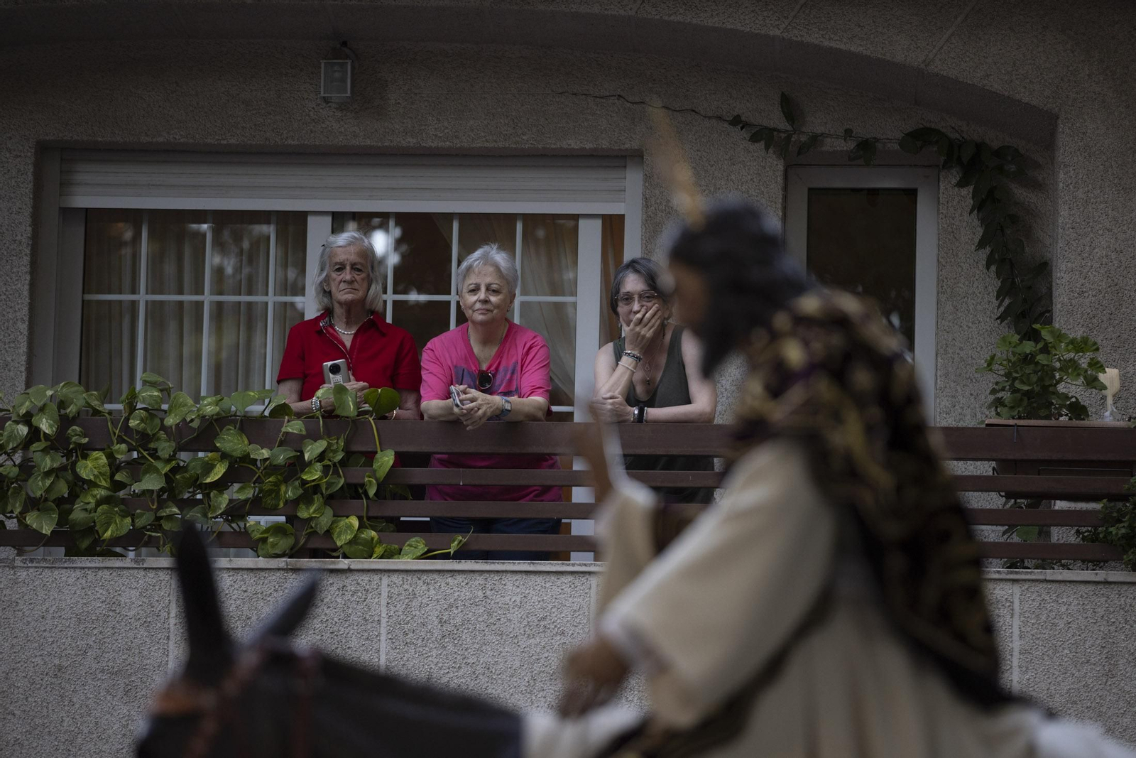 Imágenes de la salida extraordinaria de La Borriquita por las calles de Huelva