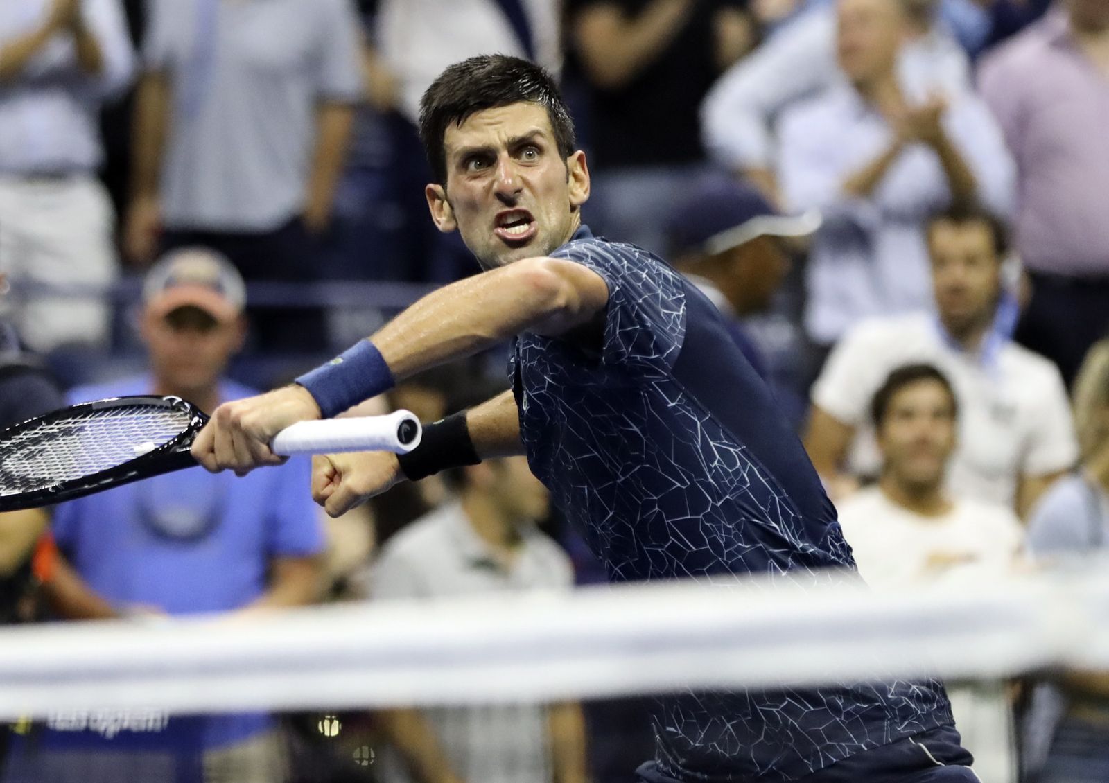 Djokovic celebrando su victoria ante Millman.