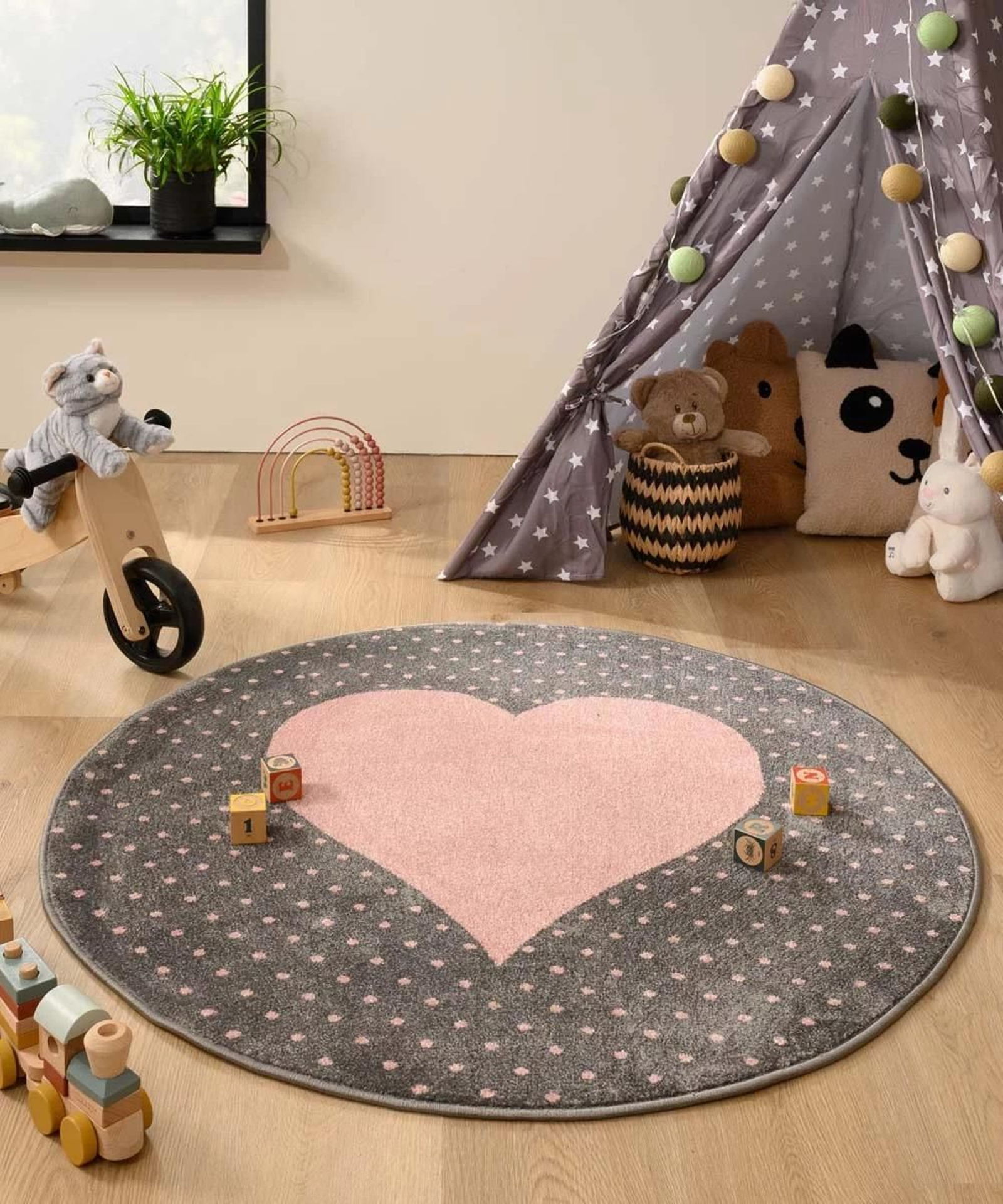 Alfombra redonda para habitación infantil rosa