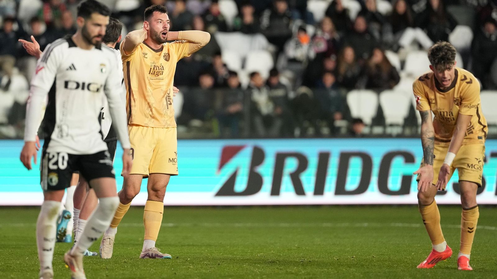 El Burgos-Málaga CF, en fotos
