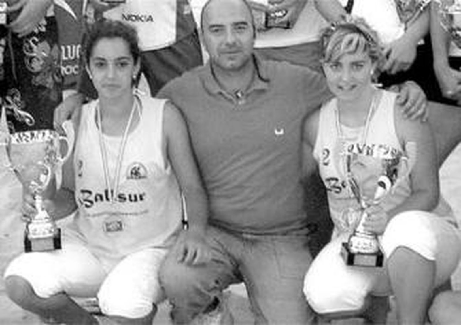 La pareja Saucedo-Muñoz, en la entrega de trofeos del Andaluz sub'19.