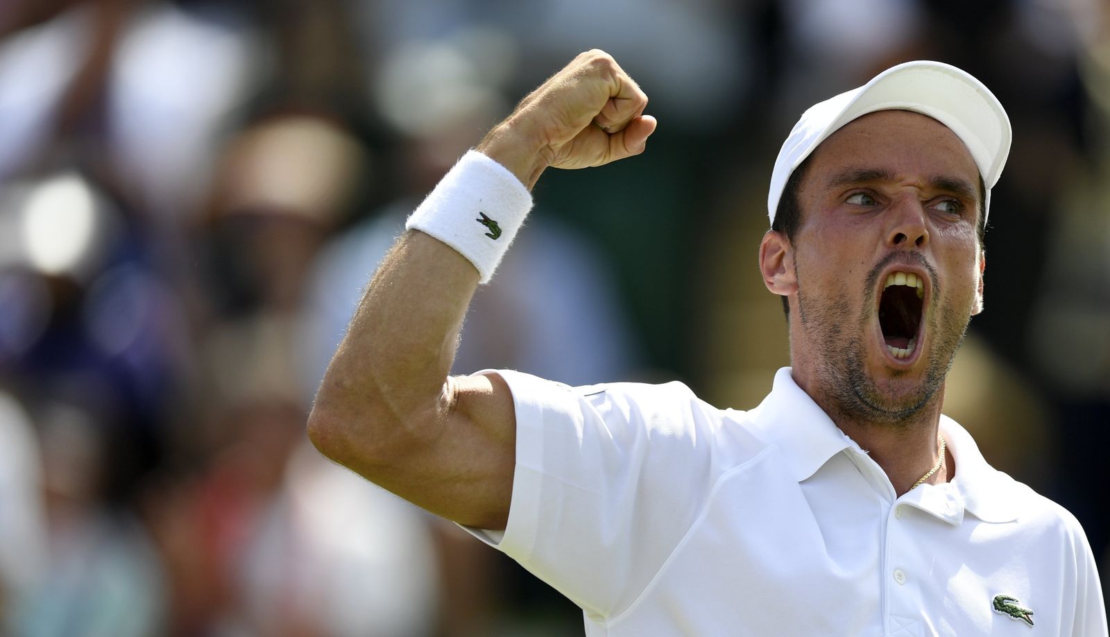 Roberto Bautista festeja su triunfo sobre Kei Nishikori en tercera ronda.