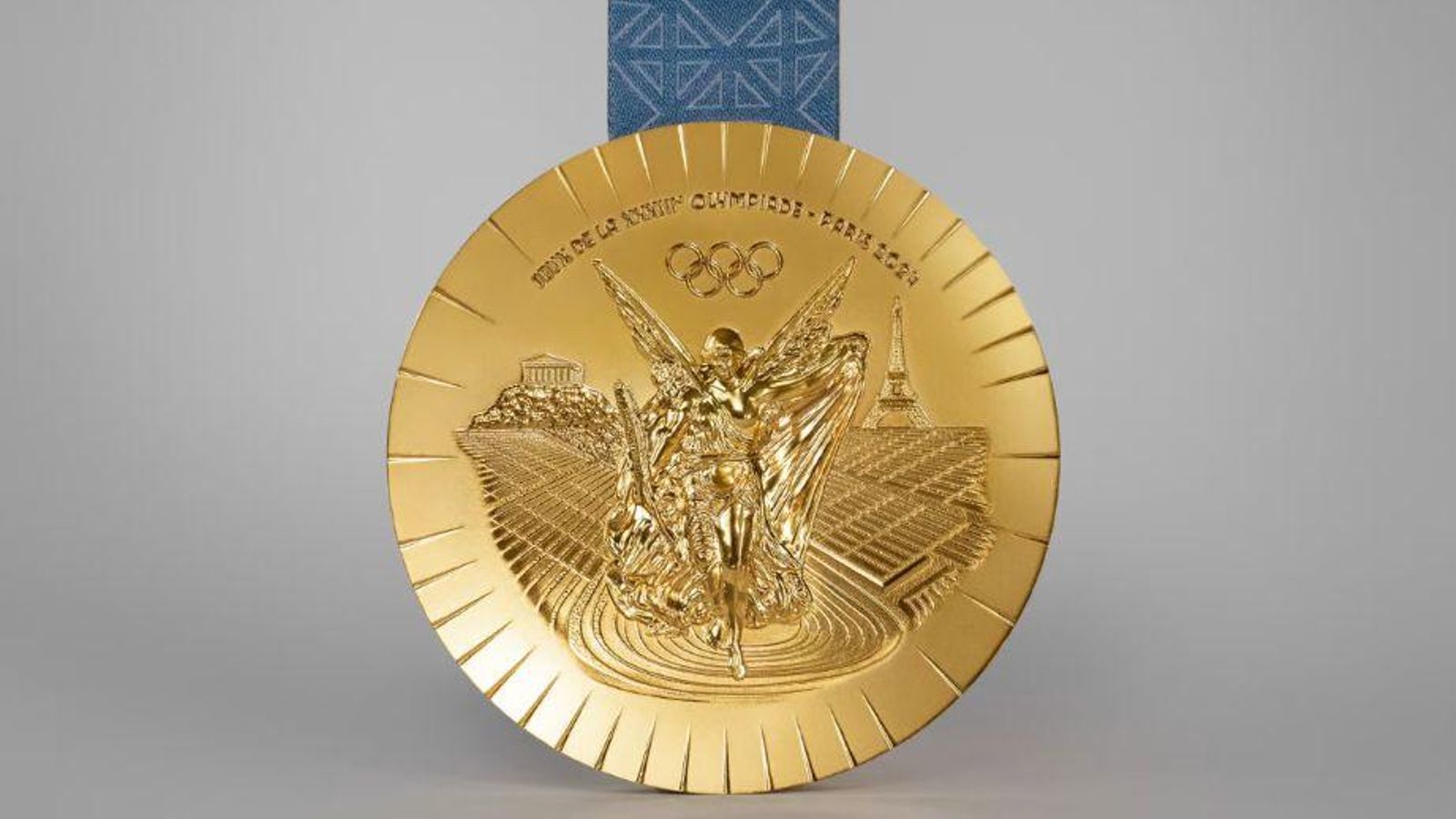 Parte trasera de la medalla olímpica Parte trasera de la medalla olímpica
