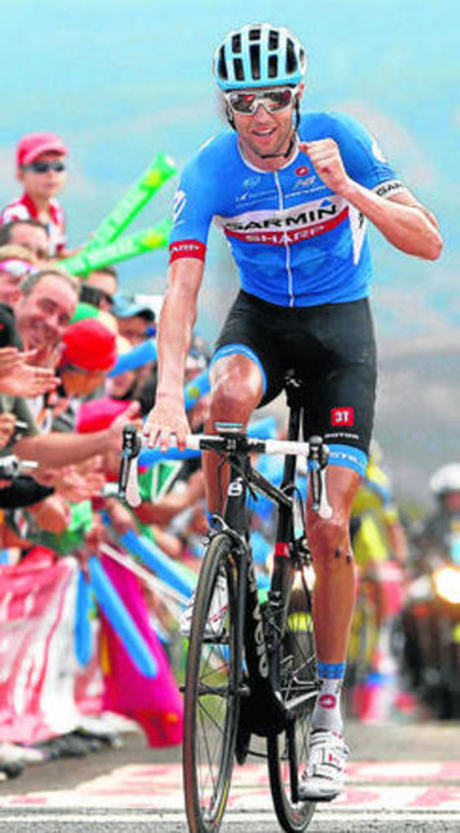 Hesjedal entra como vencedor de la decimocuarta etapa.