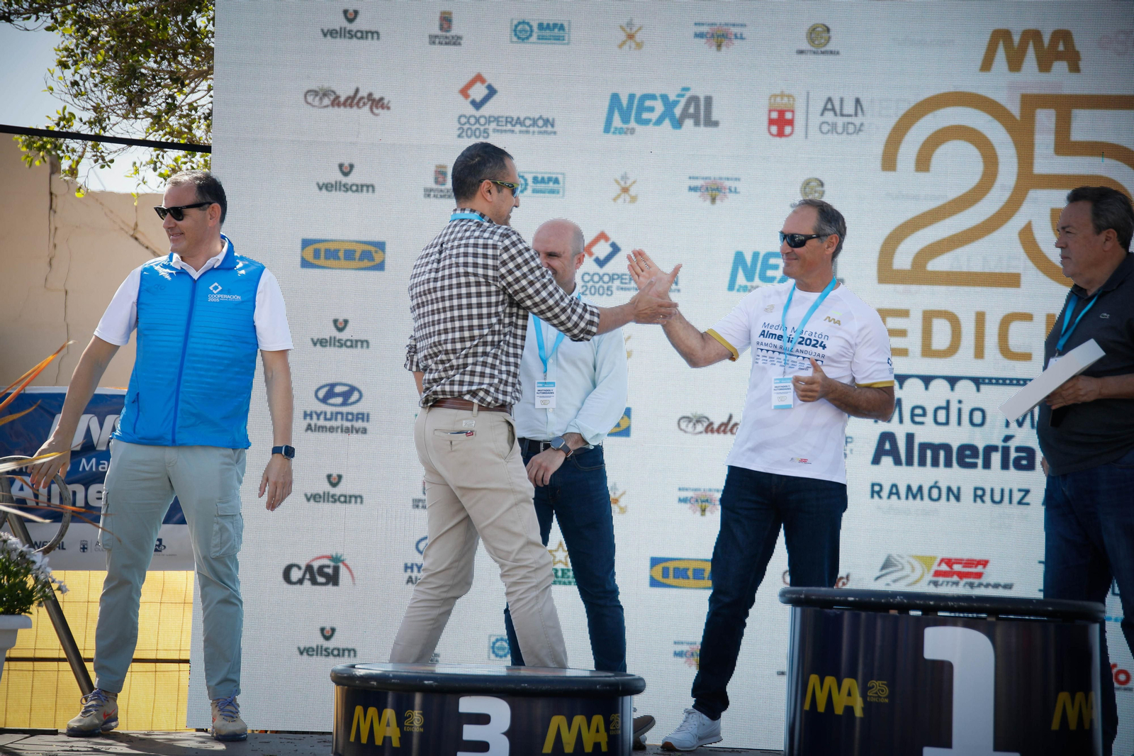 Imágenes de los premiados en la Media maratón de la Cuidad de Almería