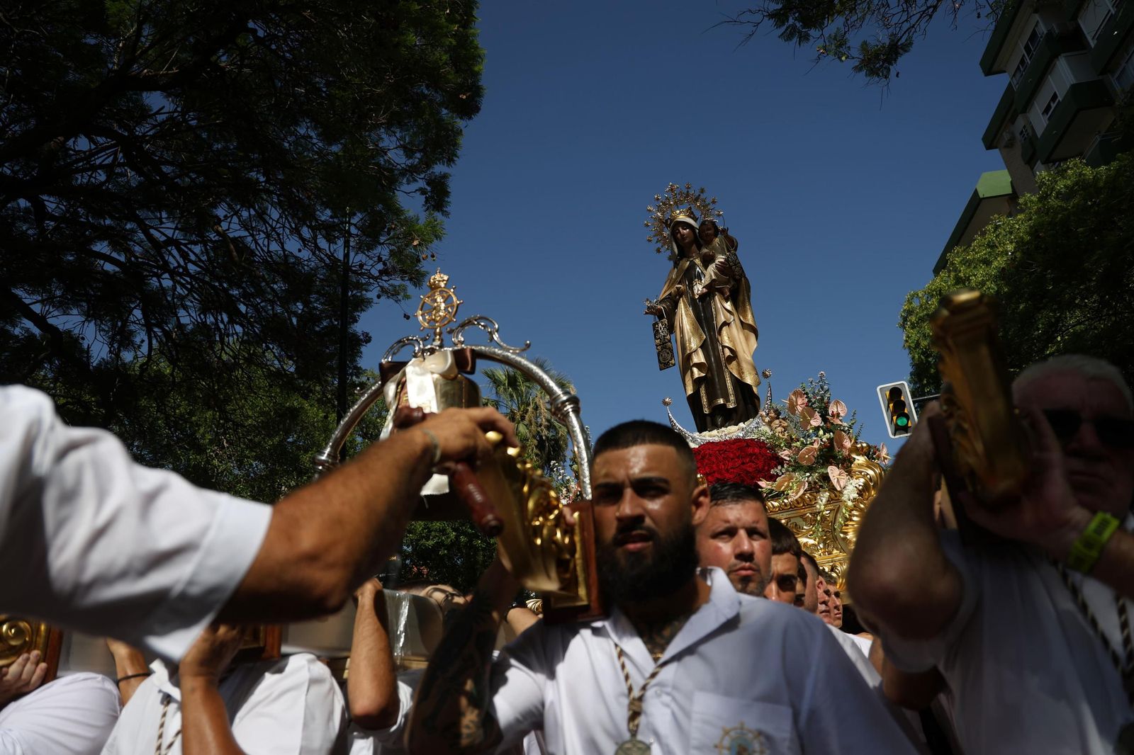 La procesión de la Virgen del Carmen en El Palo, en Málaga, en imágenes
