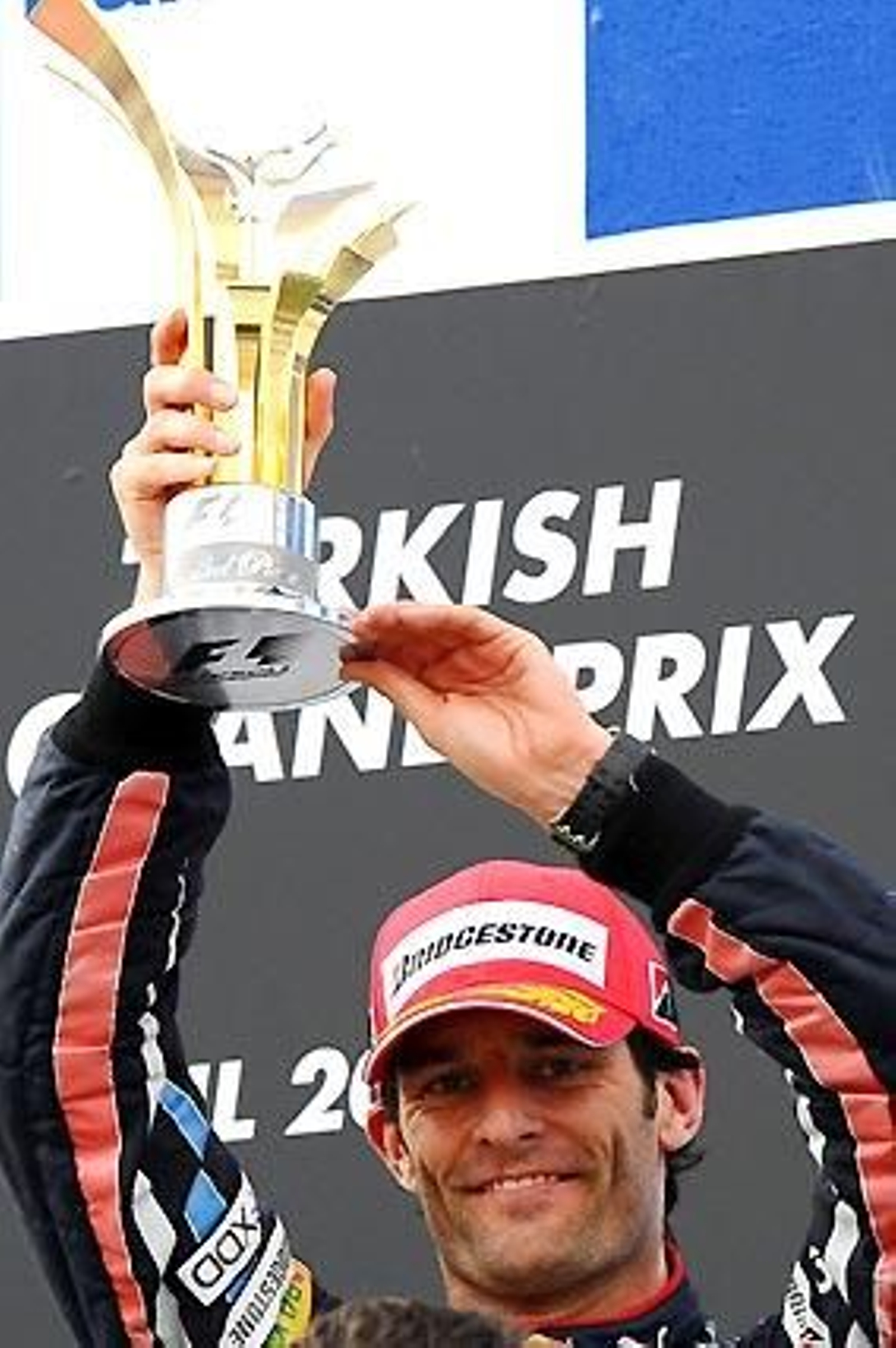 Mark Webber, en el tercer escalón del podio del Gran Premio de Turquía.

Foto: Reuters / Afp Photo / Efe