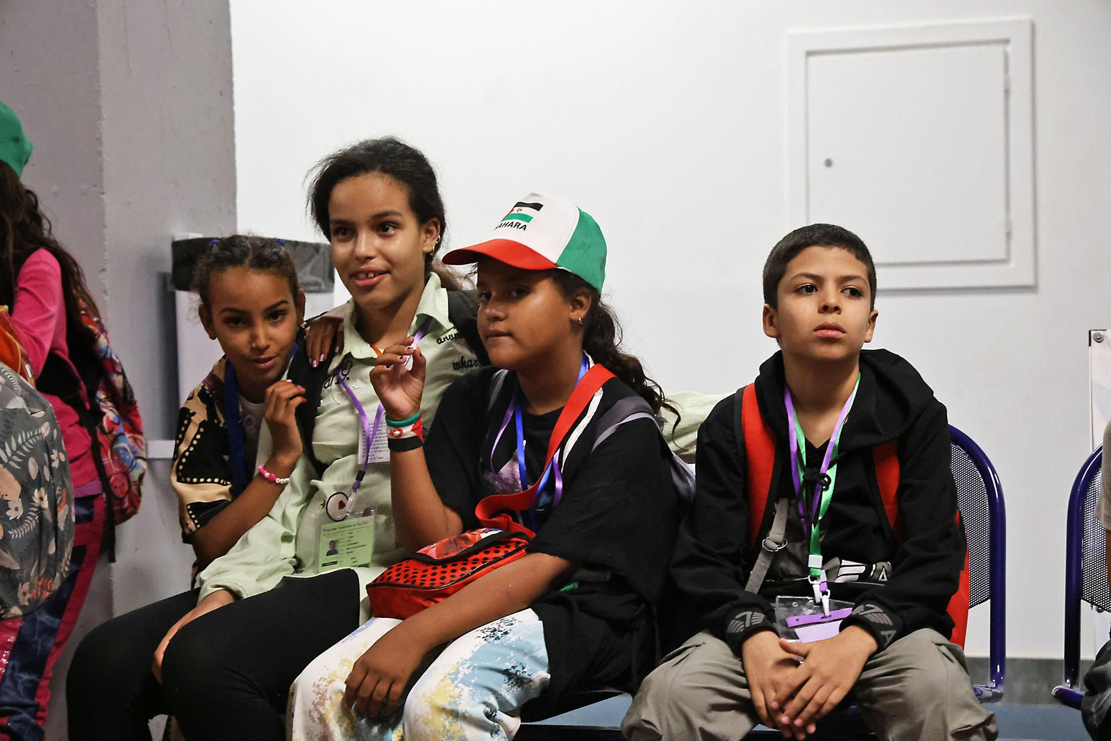 Imágenes del recibimiento a los  niños procedentes de los campamentos saharauis que pasarán sus vacaciones en Huelva