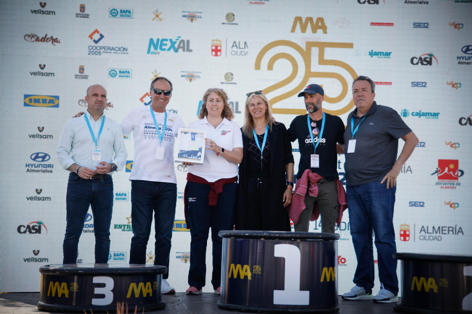 Imágenes de los premiados en la Media maratón de la Cuidad de Almería