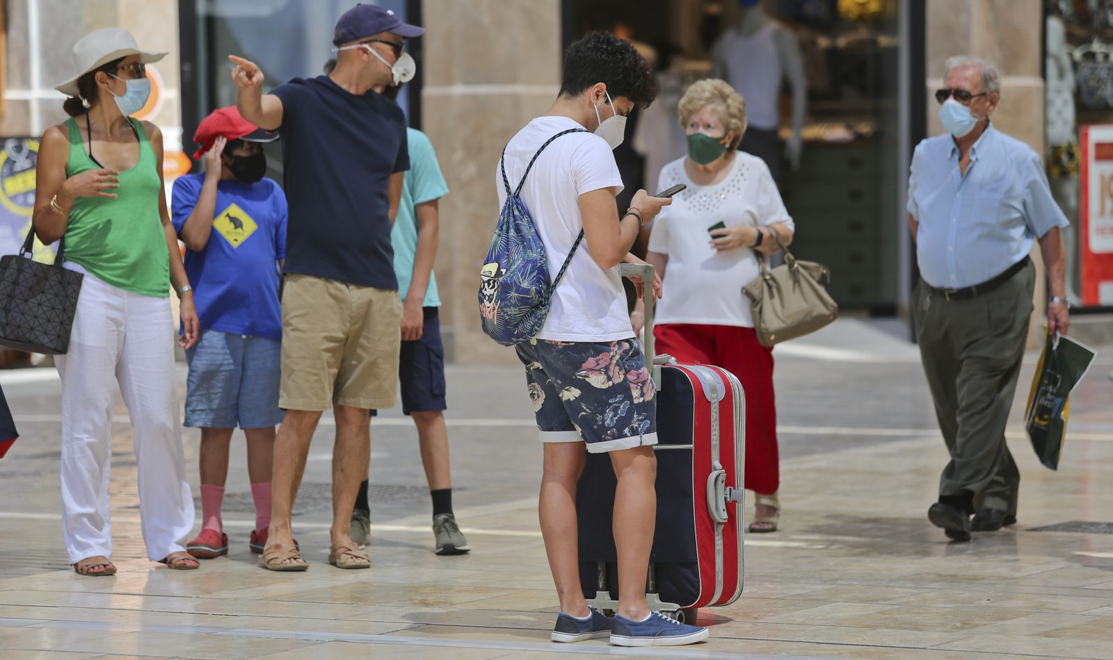 Fotos del primer día de mascarillas obligatorias en las playas y el Centro de Málaga