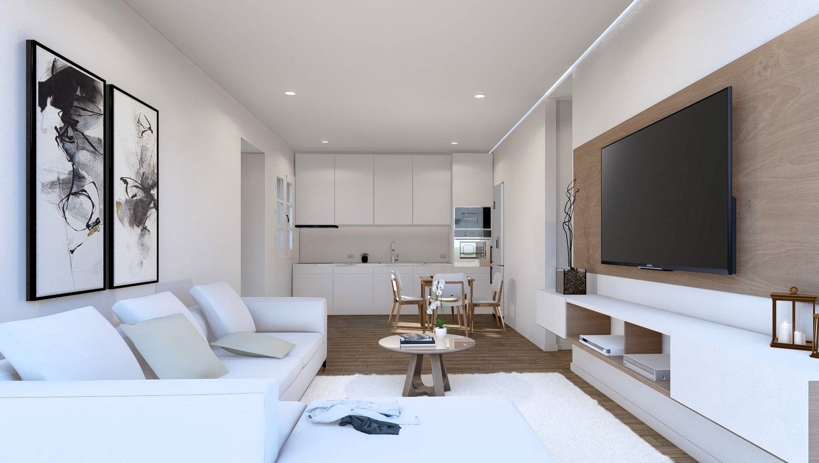 Salón con cocina integrada de unas de las viviendas.