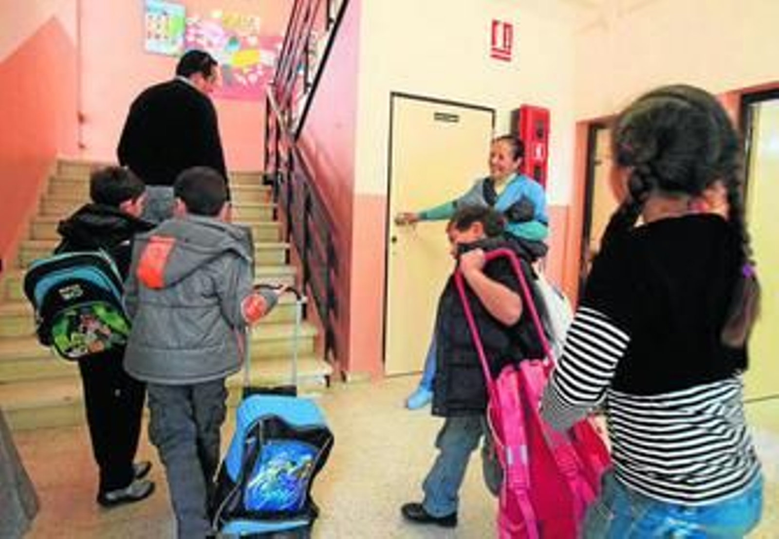 Alumnos de Primaria de un colegio público, preparados para empezar las clases.