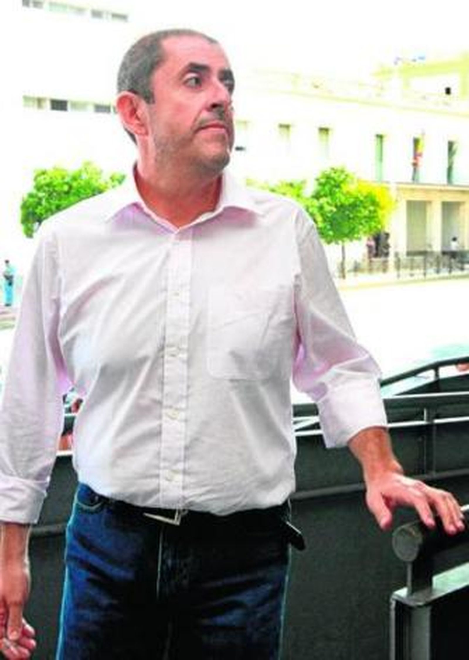 José Manuel Garrido a su llegada al Palacio de Justicia, ayer.