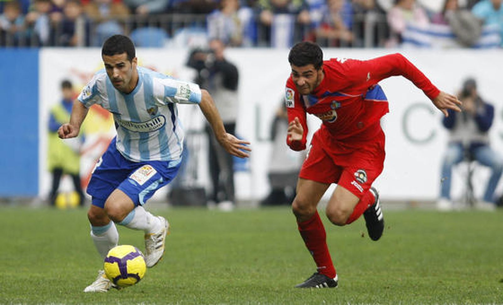 El Málaga respira tras su victoria en Liga ante el Getafe. / Sergio Camacho