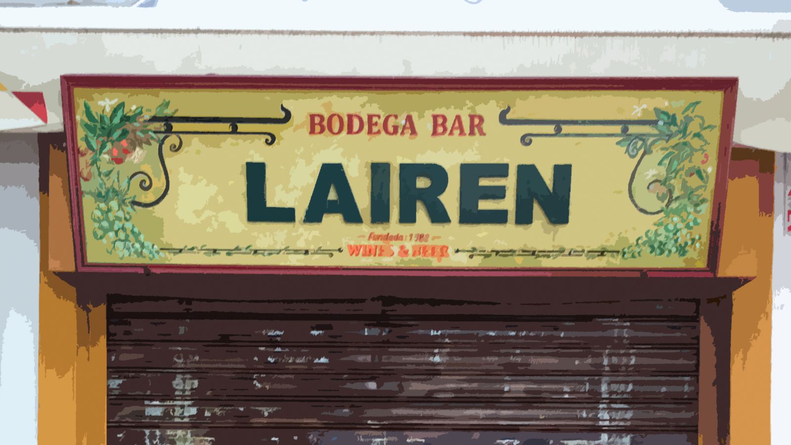 Rótulo y persiana del bar Lairén tras su cierre el pasado jueves