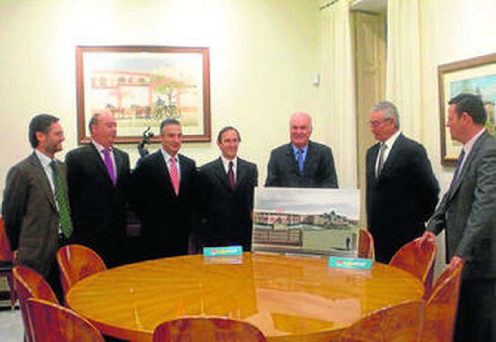 Representantes de Cajamar con miembros de la SAT Trops, para firmar el acuerdo.