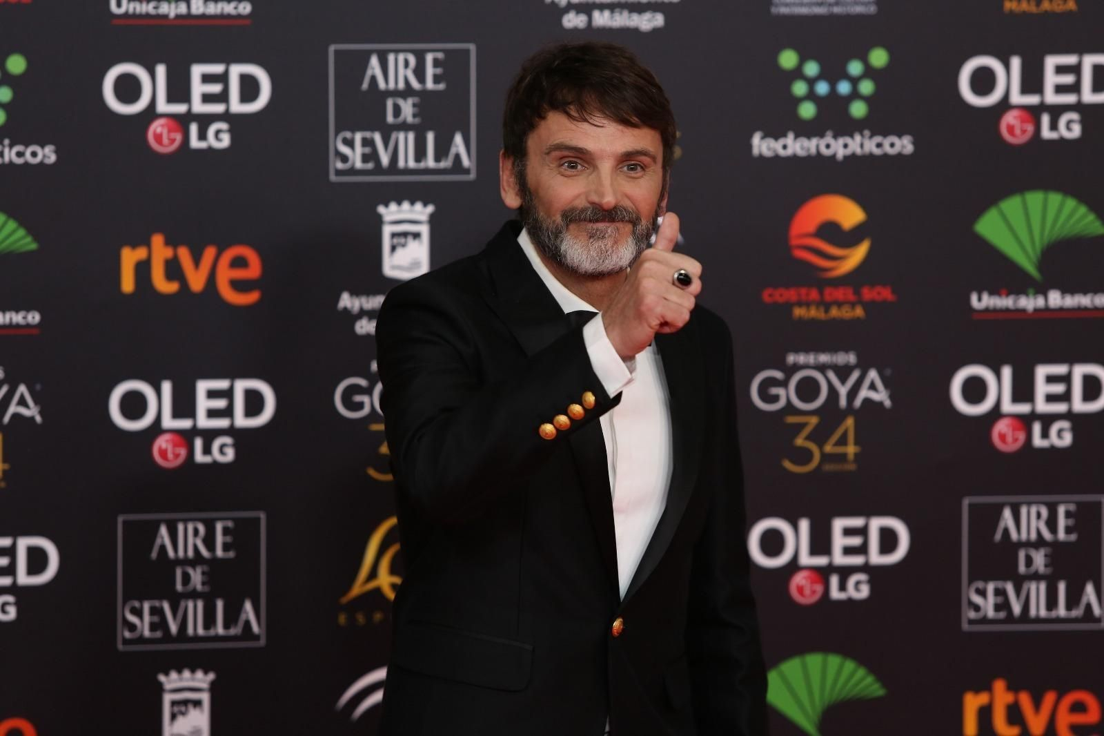 Fernando Tejero, posa para la prensa en la alfombra roja de los Goya en Málaga.