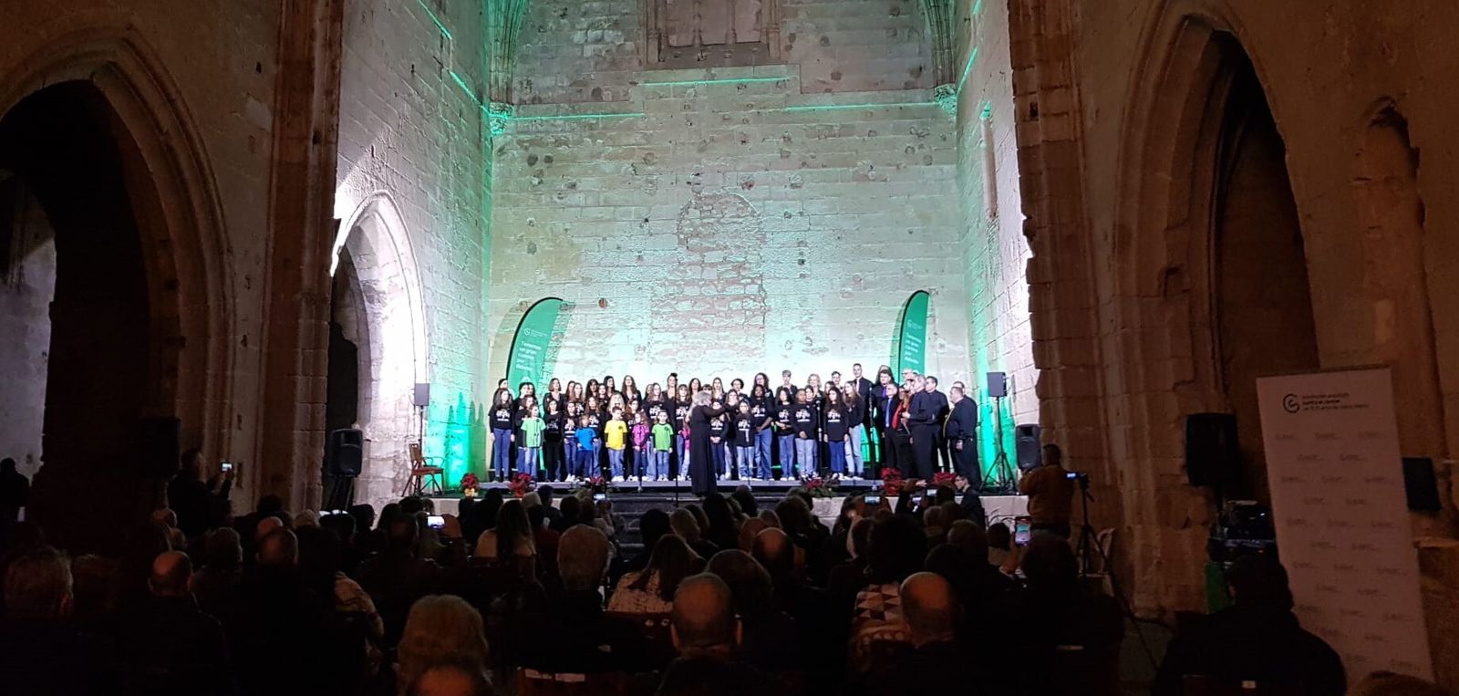 Una imagen del concierto de la Escuela Coral Jardín Menesteo en el Monasterio de la Victoria.