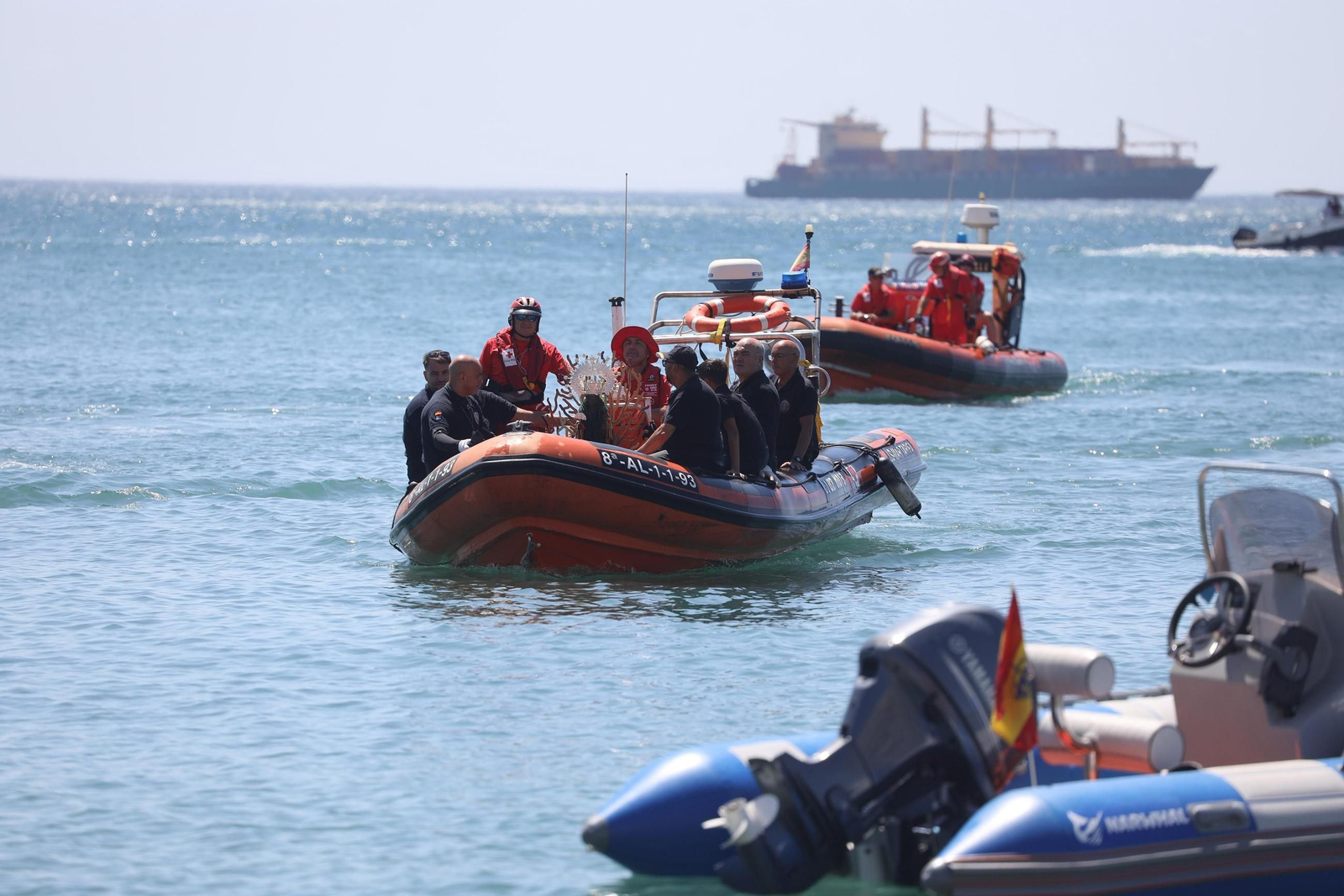 La procesión en Málaga de la Virgen del Carmen de los submarinistas, en imágenes