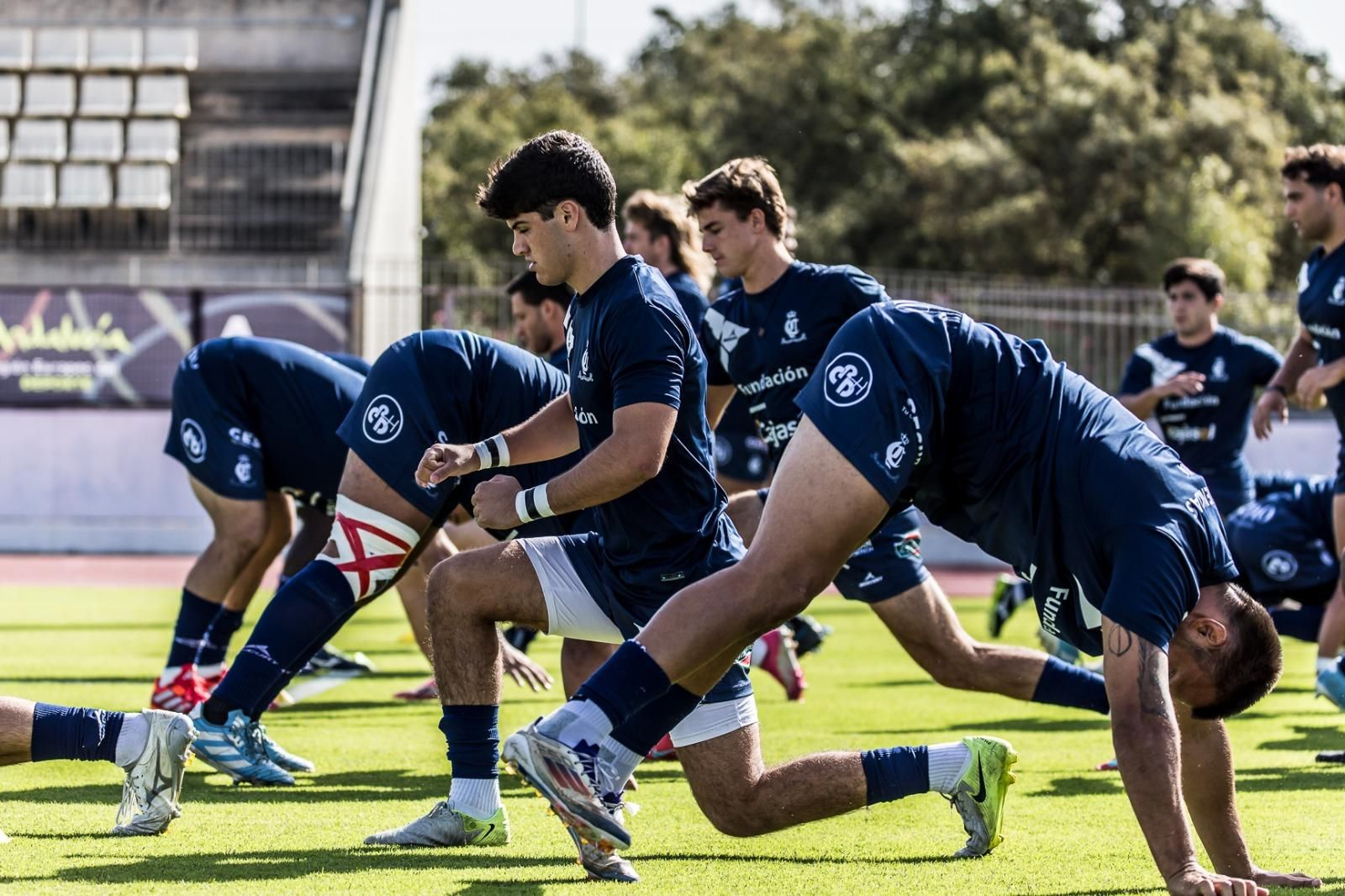 Los jugadores del Cajasol Real Ciencias Sevilla realizan el calentamiento de un partido.